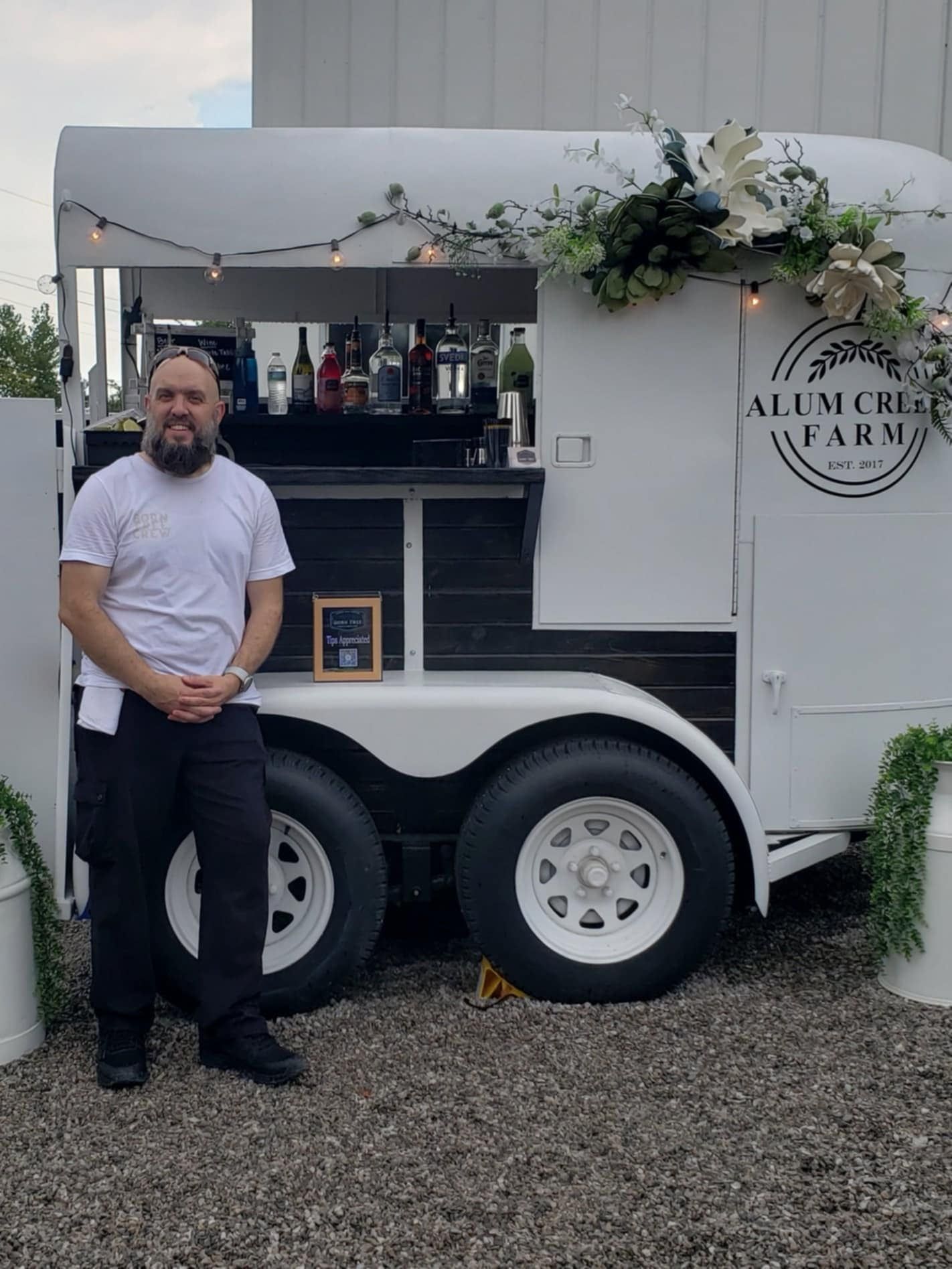 Guests queuing at the Alum Creek Farm mobile bar